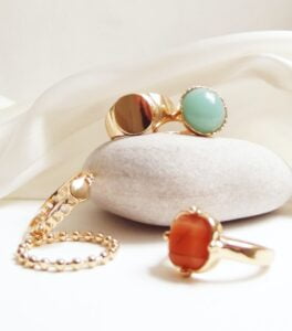gold and red beaded bracelet AV Globale's Role in Boosting Thailand's Sustainable Growth in the Gemstones and Jewelry Industry