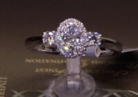 #80165 | T0.50ct | Oval Cluster with Two Round Brilliant Side Diamonds | Set in Platinum