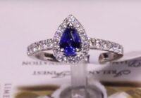 F1 - Pear Sapphire with Round Brilliant Halo and Diamond Shoulders | 18ct White Gold