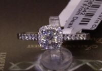 #87542 | T0.97ct | Cushion Centre with Round Brilliant Halo and Diamond Shoulders | Platinum