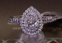 #77210 | T0.75ct | Pear Centre with Round Brilliant Double Halo and Diamond Shoulders | Platinum