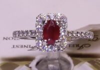 #64443 | RU0.70ct | Oval Ruby with Round Brilliant Halo and Diamond Shoulders | 18ct White Gold