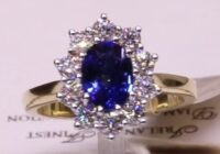#88415 | S1.35ct/D0.81ct | Oval Sapphire with Round Brilliant Cluster Halo | 18ct Yellow Gold