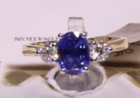 #88417 | S1.34ct/D0.44ct | Oval Sapphire with Two Round Brilliant Side Diamonds | 18ct Yellow Gold