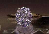 #89072 | T1.20 | Oval Centre with Round Brilliant Scalloped Halo | Set in 18ct Yellow Gold