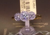 #80688 | T0.45ct | Three Stone Round Brilliant Halo | Set in 18ct Yellow Gold | 18ct Yellow Gold