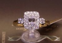 #90504 | T0.87ct | Emerald Cut with Round Brilliant Double Halo Two Side Diamonds | 18ct Yellow Gold
