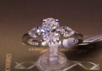 #90854 | T1.96ct | Oval with Two Pear Side Diamonds | Set in Platinum