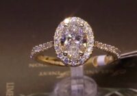 #91038 | T1.44ct | Oval with Round Brilliant Halo and Diamond Shoulders | Set in 18ct Yellow Gold
