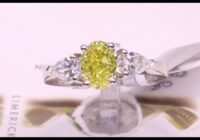 #91142 | T1.82ct | Oval Yellow Diamond with Two Pear Side Diamonds | Set in Platinum
