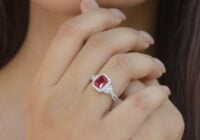 Close-up of Woman Wearing a Silver Ring with a Ruby Stone